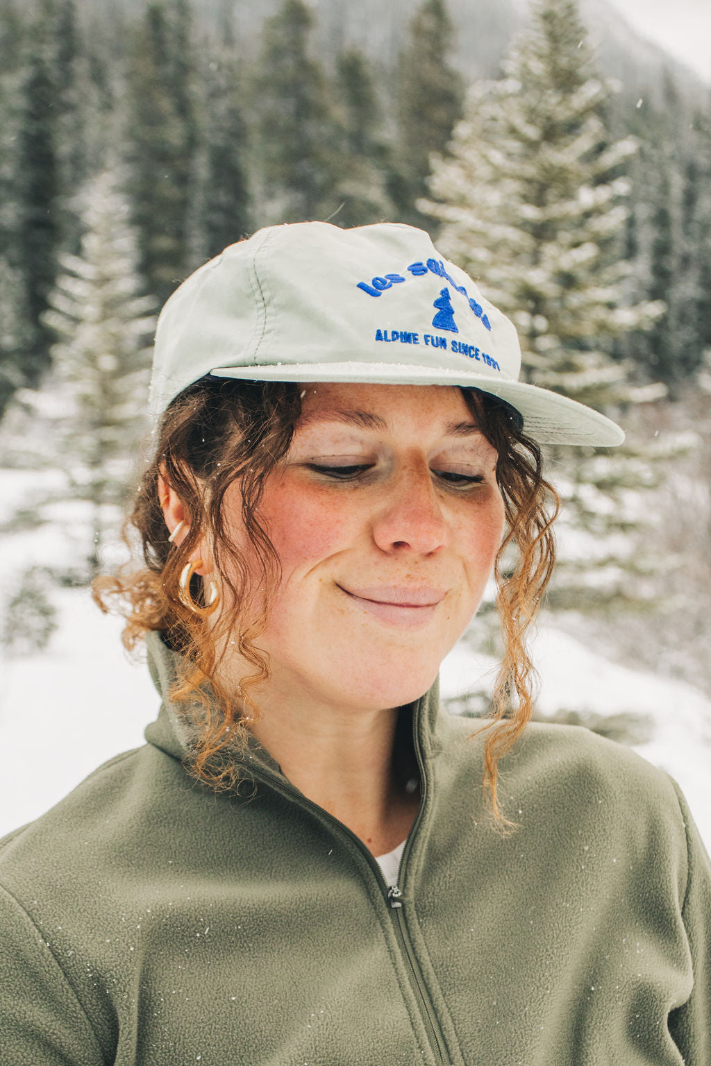 Alpine Fun cap, sage cap great for running, skiing, retro look. Outdoor in the snow, how it fits