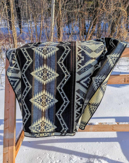 boho blanket colorful les Saisons. tones of brown, beige, white, light blue, black, camping blanket, warm, soft, acrylic, made in Ecuador, Large, picnic, vanlife, unique designs, reversible, light and foldable